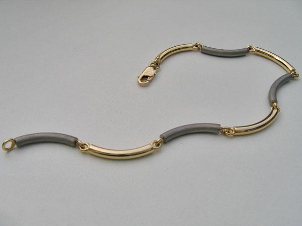 armband geelgoud en titanium