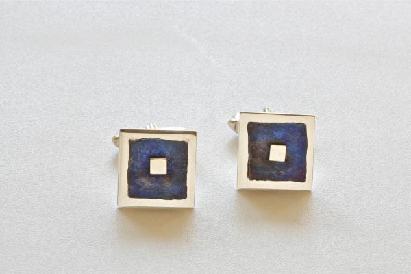 manchteknopen blauw titanium zilver